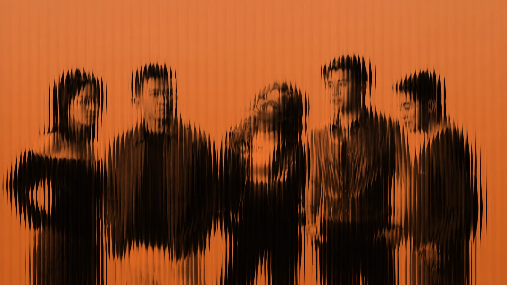 The current five members of Pinopela photographed through ribbed glass on orange