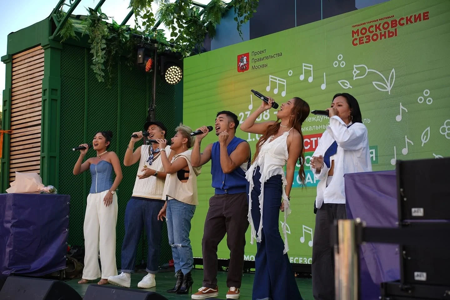 Pinopela performing on an outdoor festival stage