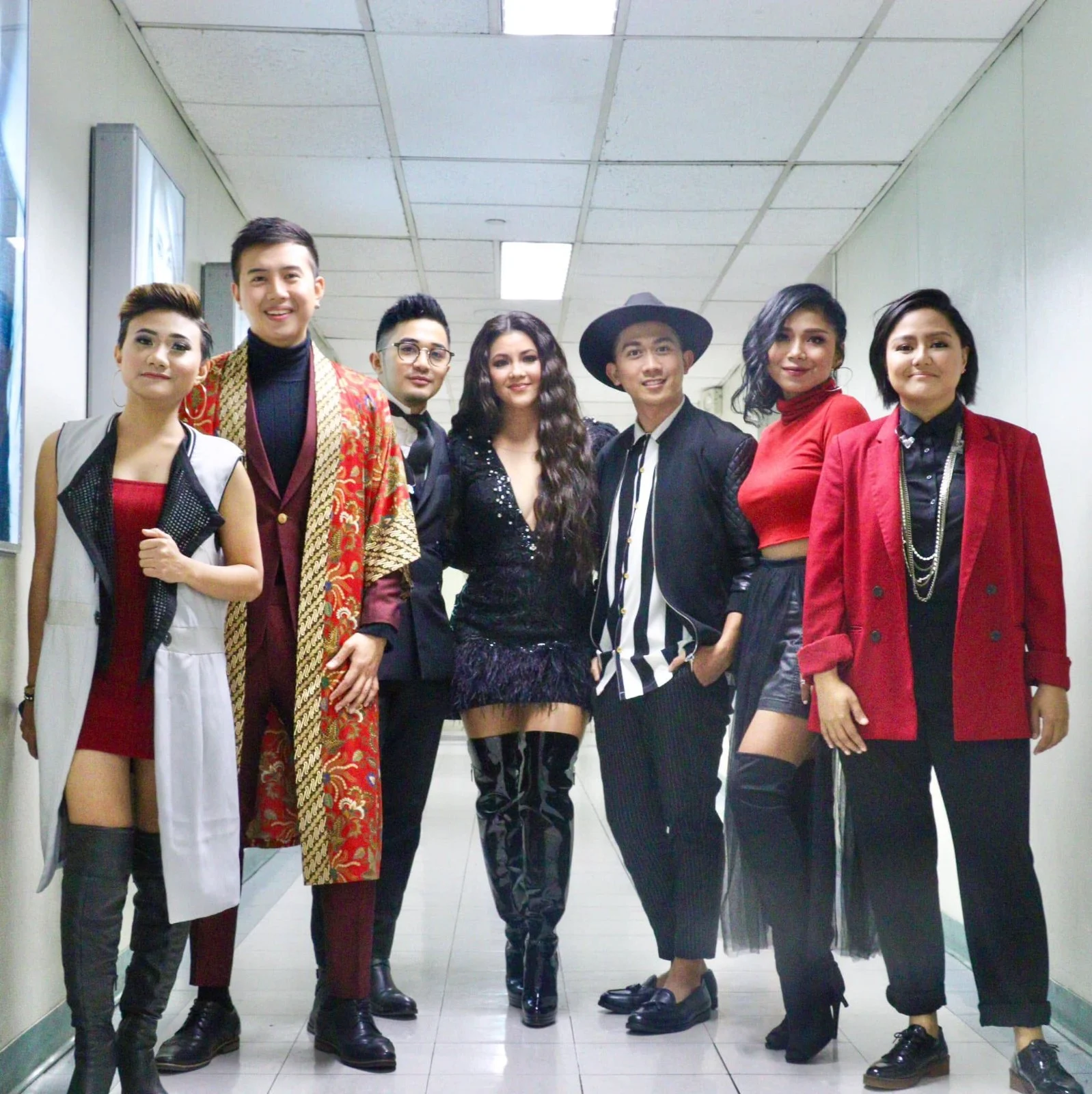 Pinopela backstage in a corridor in performance dress